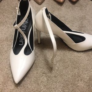 White Calvin Klein pumps